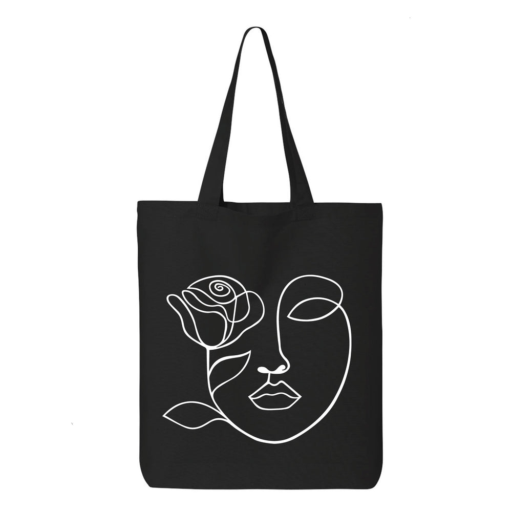 
                  
                    One Line Face With Flower Tote Bag
                  
                